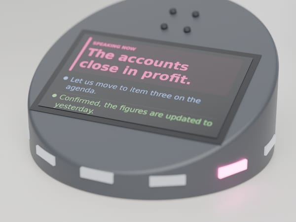 Concept render: a disc in the middle of a meeting table, with an LED ring where one LED is lit magenta, and a 5-inch display showing the current speaker's sentence in magenta above the previous turns, each in its speaker's colour.